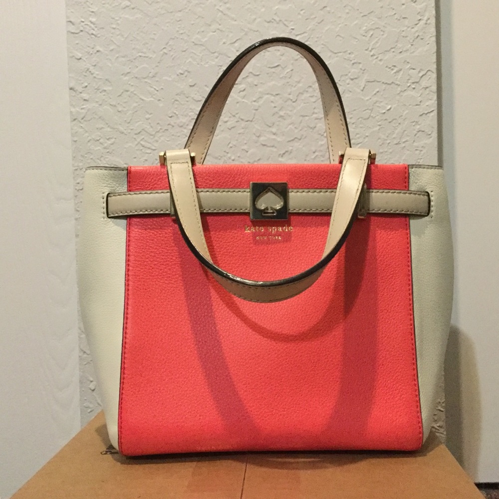 Pink and white kate spade purse